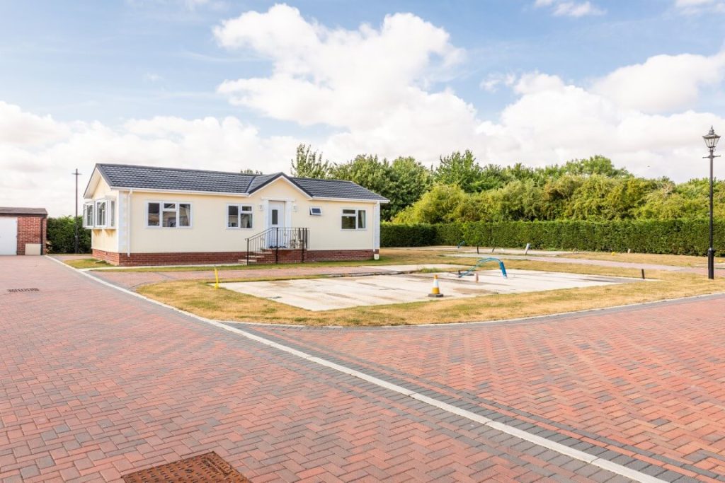 An empty plot for a new park home at Parklands of Lincoln